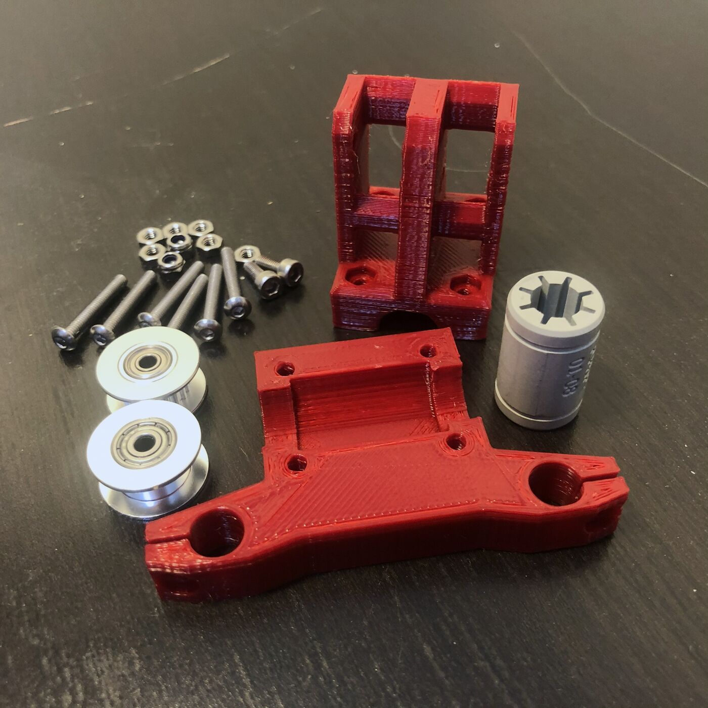3D-printed axis carriage assembly with precision bearings and hardware